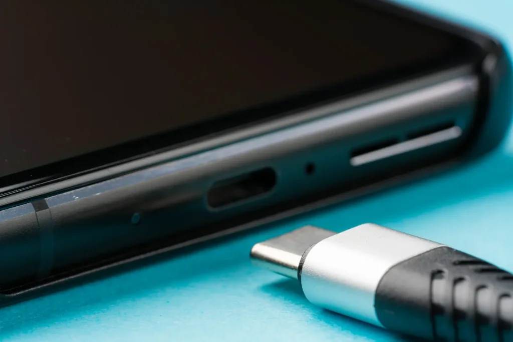 scotia-charging-port-repair USB-C cable next to a phone charging port